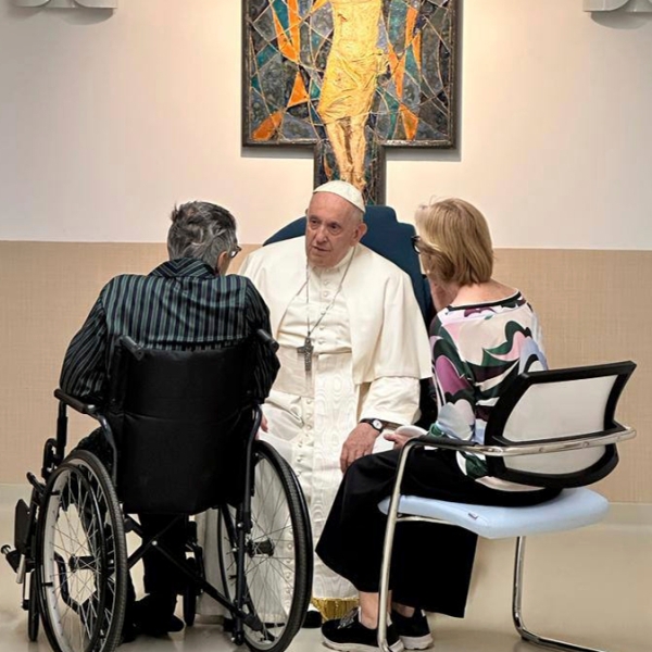 In this image distributed by Vatican Media, Pope Francis visits the Pediatric Oncology ward of the Agostino Gemelli University Polyclinic in Rome Thursday, June 15, 2023, where he's recovering from abdominal surgery since June 7. Francis, 86, underwent the operation to repair a hernia in the abdominal wall and to remove scar tissue that had formed following intestinal surgery in previous years. (Vatican Media via AP, ho)