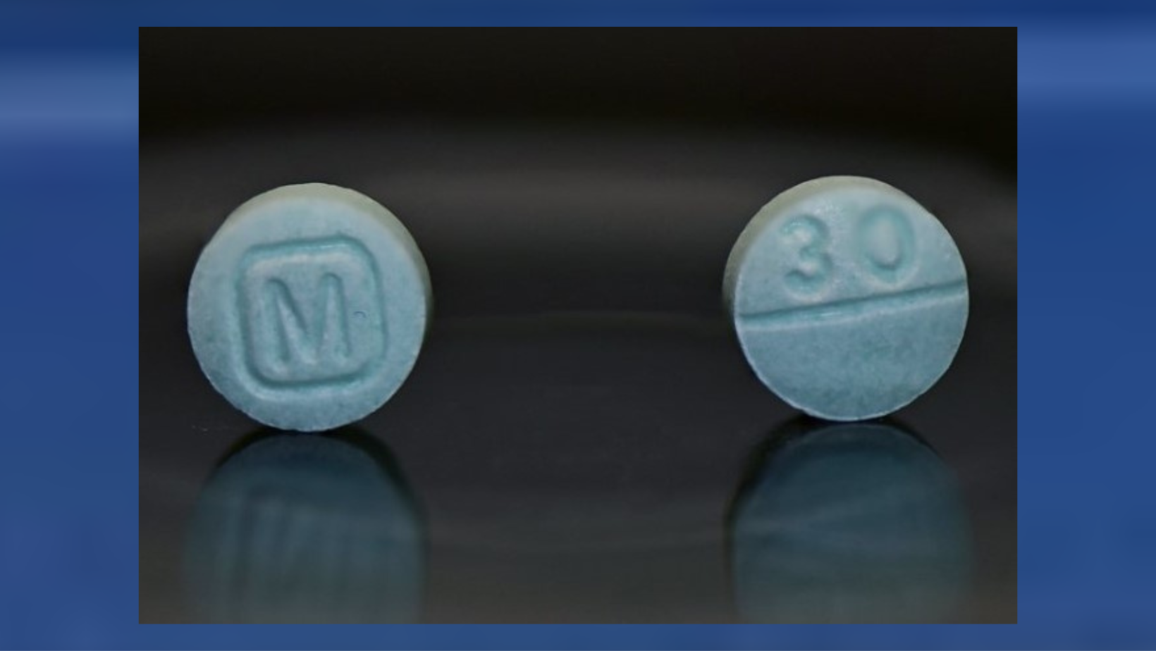 In this photo there are two fentanyl pills that show the front and back of a tablet. (Photo/Hawaiʻi Police Department)